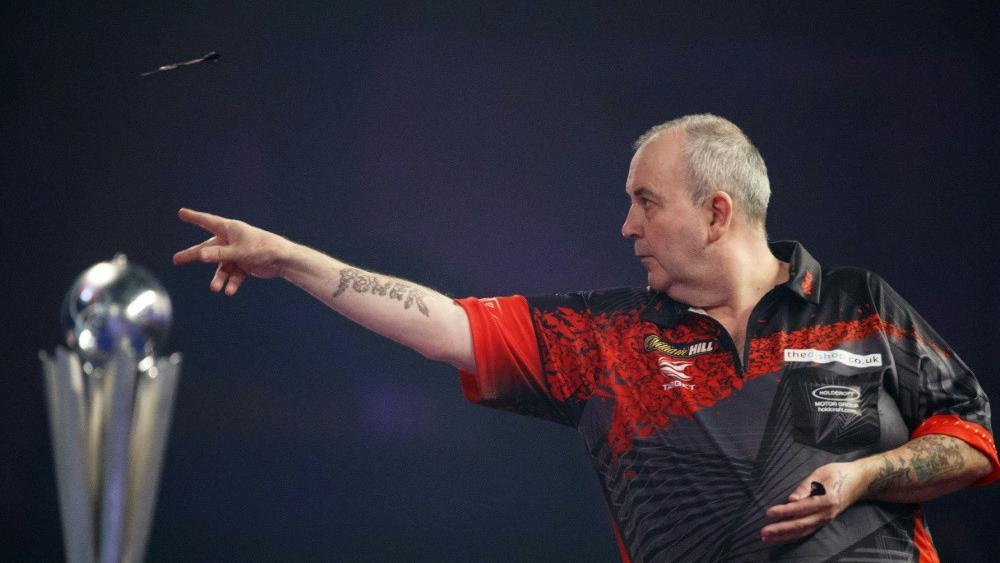 Taylor und van Barneveld spielen für den guten Zweck © SID / TOLGA AKMEN