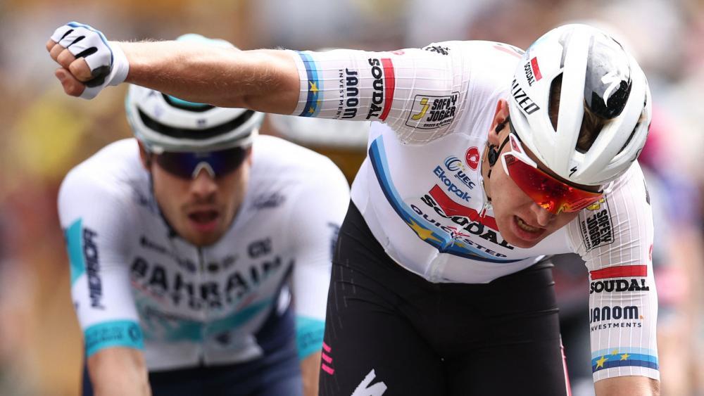 Tim Merlier s'est imposé sur Jonathan Milan. © APA/afp / ANNE-CHRISTINE POUJOULAT