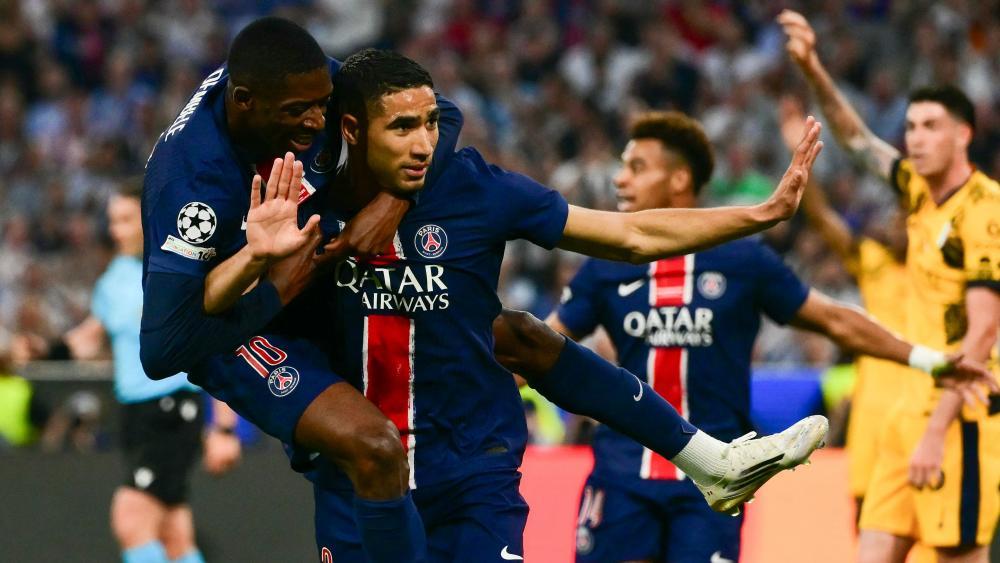 Ousmane Dembélé and Achraf Hakimi are suddenly rivals. © APA/afp / MARCO BERTORELLO