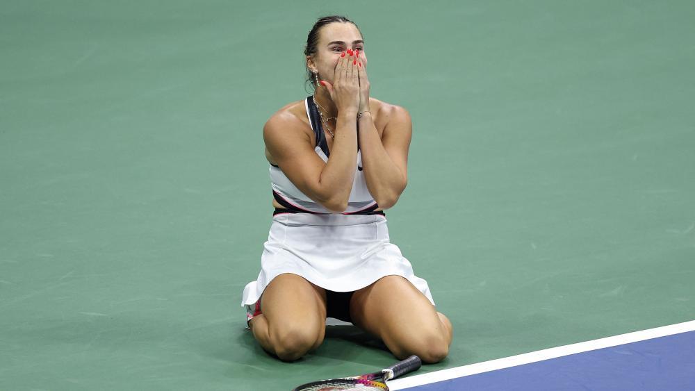 Aryna Sabalenka kann es nicht fassen: Sie gewann die US Open. © APA / CLIVE BRUNSKILL