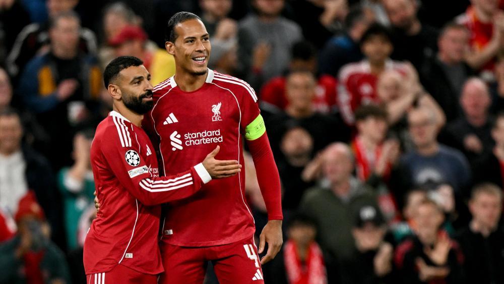 Mohamed Salah and Virgil van Dijk (right) led Liverpool to a late victory. © APA/afp / OLI SCARFF