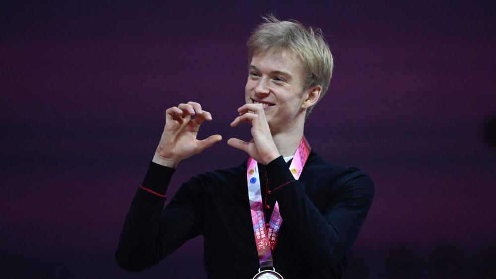 Daniel Grassl freute sich über seinen Auftritt. © APA/afp / WANG ZHAO