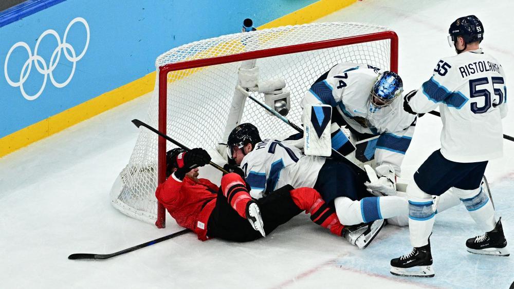 Finnland und Kanada lieferten sich einen packenden Kampf. © APA/afp / JULIEN DE ROSA