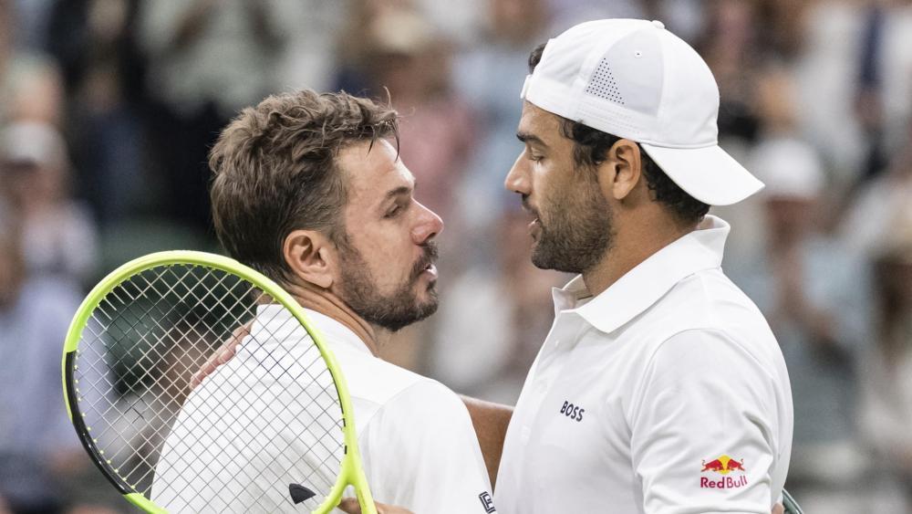 Matteo Berrettini (r.) zollte Stan Wawrinka bei dessen letzten Wimbledon-Auftritt viel Respekt. © ANSA / ALESSANDRO DELLA VALLE