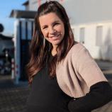 A ski queen is about to have a baby.