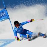 Anna Trocker bei ihrem Heim-Debüt am Kronplatz. © APA/afp / MARCO BERTORELLO