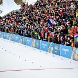 Julia Simon holte mit Frankreichs Mixed-Staffel Gold. © ANSA / MARTIN METELKO