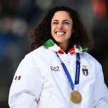 So lächelt ein Champion: Federica Brignone holte Doppel-Gold. © APA/afp / MARCO BERTORELLO