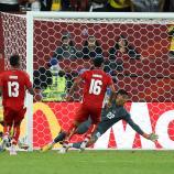 Ghana (in gelb) schlug in der Nachspielzeit zu. © APA/afp / COLE BURSTON