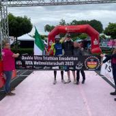 A happy Christian Klotz (l.) at the finish of the Double Ironman World Championship.