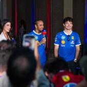 Lewis Hamilton (center) and Charles Leclerc. © ANSA / DAVIDE CANELLA