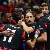 Luka Modric et les joueurs milanais célèbrent la victoire à domicile contre Naples. © APA/afp / PIERO CRUCIATTI