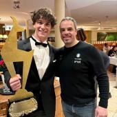 Giovanni Franzoni and Peter Fill pose with the golden chamois.