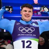 Dominik Fischnaller ließ die Muskeln spielen. © APA/afp / MARCO BERTORELLO