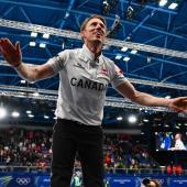 Marc Kennedy ist mit Kanada Olympiasieger. © APA/afp / MARCO BERTORELLO