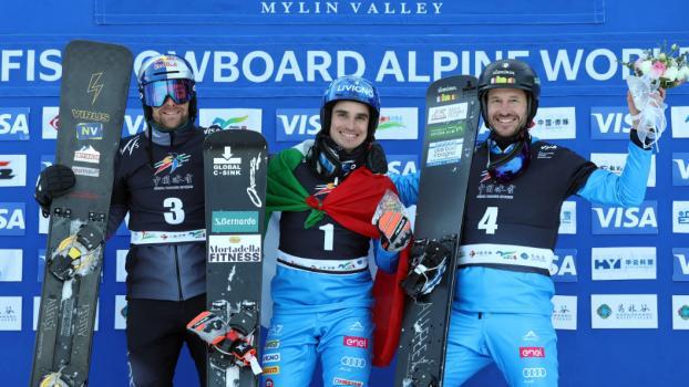 The podium in Mylin with Benjamin Karl, Maurizio Bormolini and Aaron March. © Miha Matavz / FIS