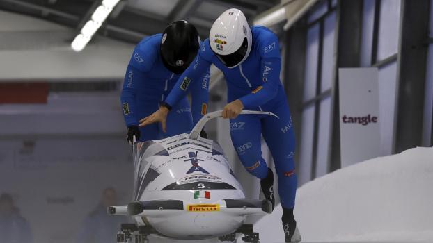 Patrick Baumgartner (front) and Robert Mircea finished in eighth place. © ANSA / TOMS KALNINS