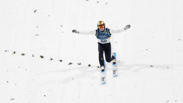 Domen Prevc ist Olympiasieger von der Großschanze. © APA/afp / ANNE-CHRISTINE POUJOULAT