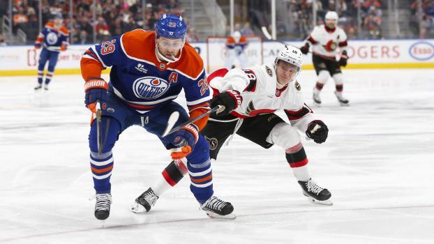 In Mailand Teamkollegen, jetzt Gegner: Leon Draisaitl (l.) und Tim Stützle (r.) © APA / CODIE MCLACHLAN