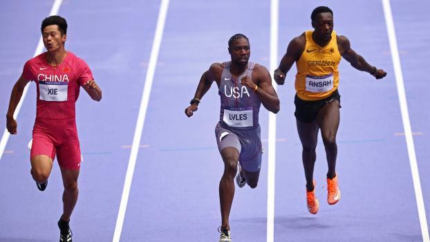Owen Ansah (à l'extrême droite) est considéré comme le plus grand espoir du sprint allemand. © APA/afp / ANNE-CHRISTINE POUJOULAT