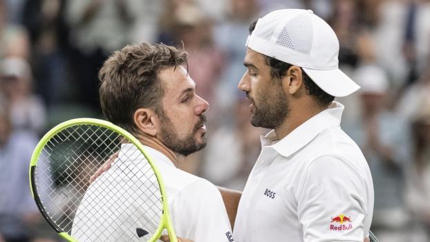 Matteo Berrettini (r.) zollte Stan Wawrinka bei dessen letzten Wimbledon-Auftritt viel Respekt. © ANSA / ALESSANDRO DELLA VALLE