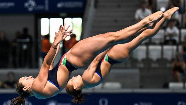 Pellacani und Pizzini in Aktion. © APA/afp / JULIEN DE ROSA