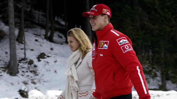 Michael Schumacher und seine Ehefrau Corinna. © AFP / VINCENZO PINTO