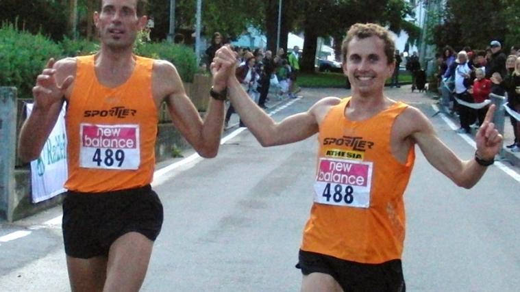 Edi Lahner and Hannes Rungger cross the finish line together