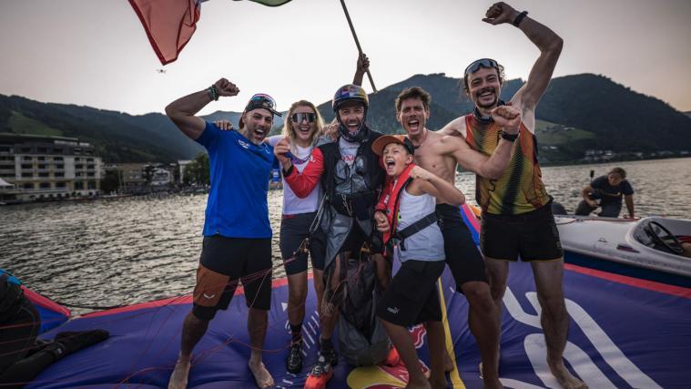 Aaron Durogati celebrates with his team at Lake Zell.