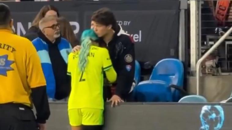 Tennis star comforts his girlfriend. © Screenshot