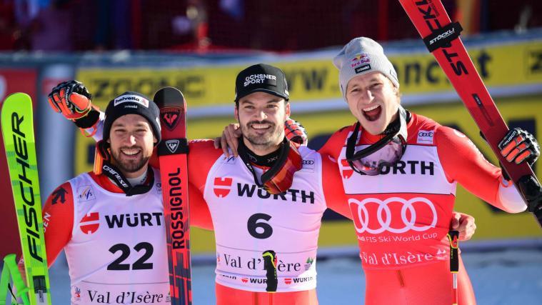 Luca Aerni, Loic Meillard und Marco Odermatt strahlen in der französischen Sonne. © APA/afp / OLIVIER CHASSIGNOLE