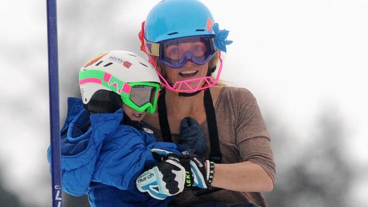 Ein Bild aus dem Jahr 2011: Sarah Schleper mit Sohn Lasse. © AFP / SAMUEL KUBANI