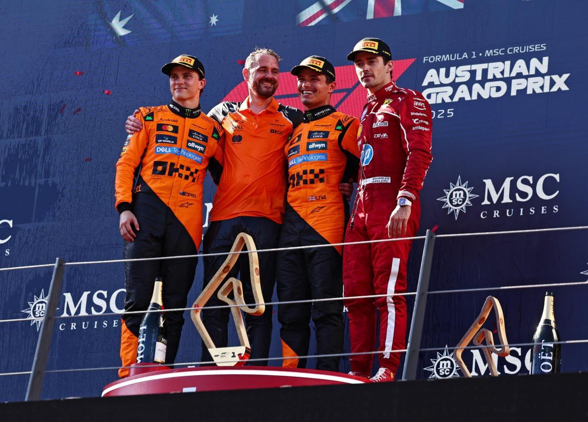 Das Siegerpodium mit Oscar Piastri, Lando Norris und Charles Leclerc. © ANSA / ANNA SZILAGYI