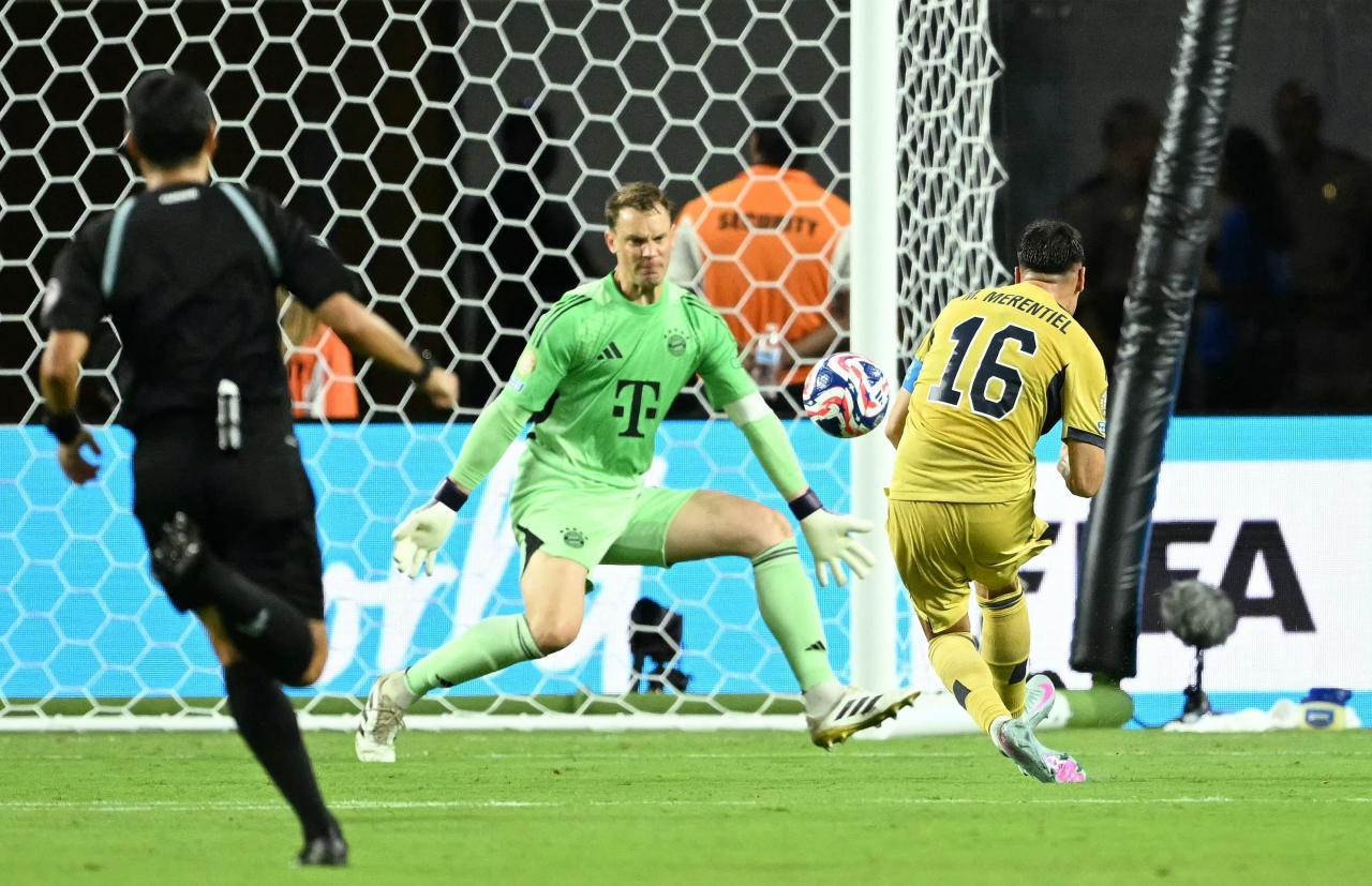 Miguel Marentiel scores against Manuel Neuer. © APA/afp / PATRICIA DE MELO MOREIRA