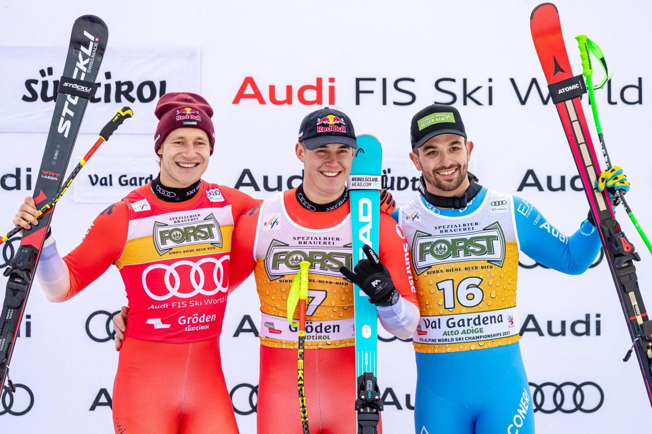 Marco Odermatt, Franjo von Allmen und Florian Schieder. © ANSA / LUCIANO SOLERO