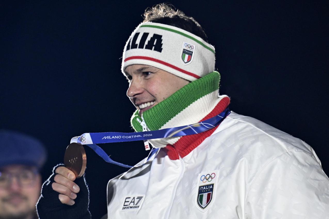 Da ist das Ding: Fischnaller jubelt über Bronze. © ANSA / DANIEL DAL ZENNARO