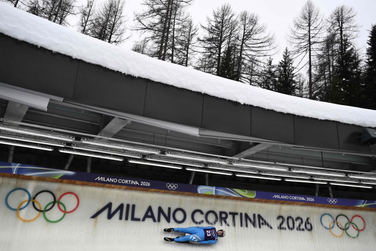 Leon Felderer auf der neuen Olympia-Bahn. © APA/afp / MARCO BERTORELLO