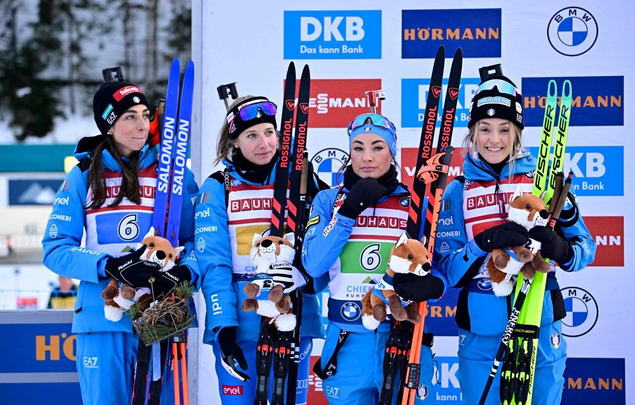 Lisa Vittozzi, Michela Carrara, Dorothea Wierer und Hannah Auchentaller bilden das Frauen-Team bei Olympia. © APA/afp / TOBIAS SCHWARZ