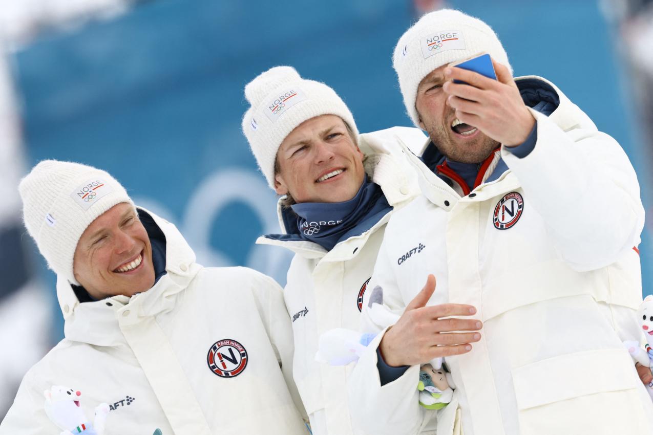 Martin Nyenget, Johannes Klaebo und Emil Iversen (v.l.) © APA/afp / ANNE-CHRISTINE POUJOULAT