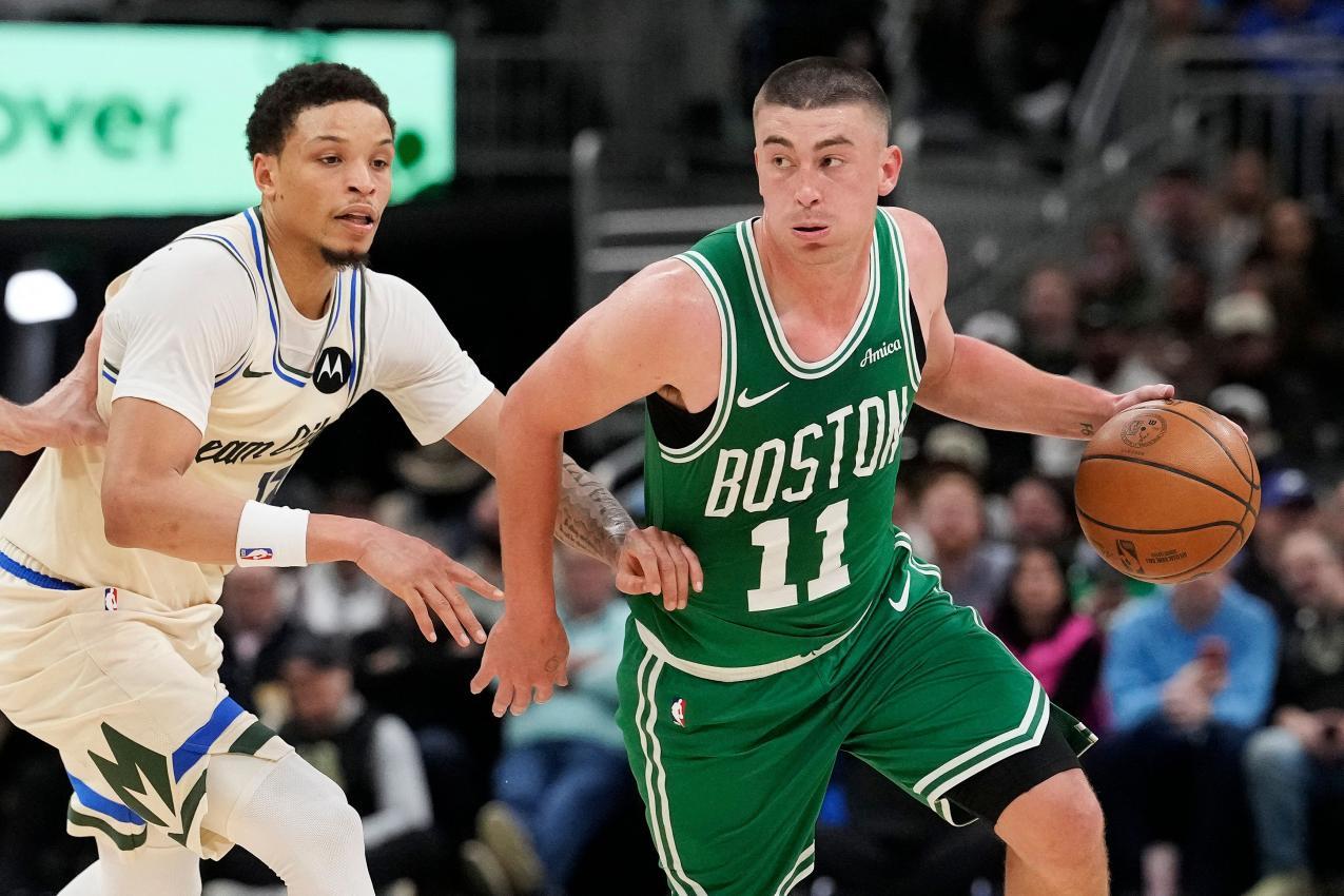 Payton Pritchard (r.) führte die Celtics zum Sieg. © APA / PATRICK MCDERMOTT