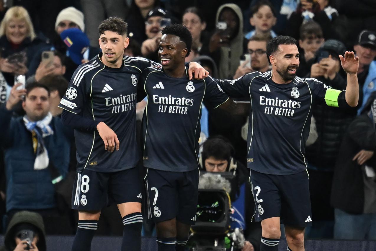 Vinicius Junior (Mitte) traf gegen ManCity zweimal. © APA/afp / PAUL ELLIS