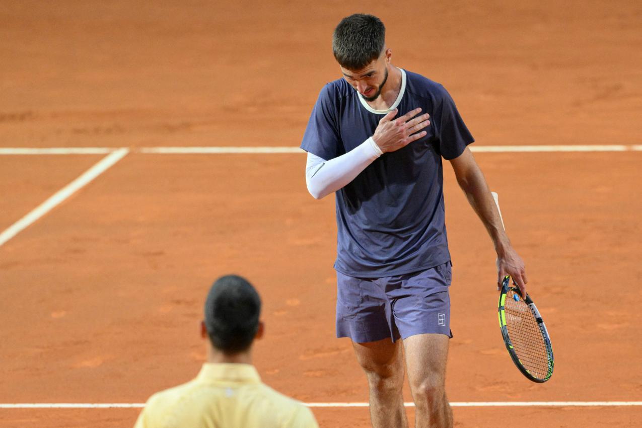 Dino Prizmic bezeichnete Djokovic als sein „Idol“. © APA/afp / TIZIANA FABI