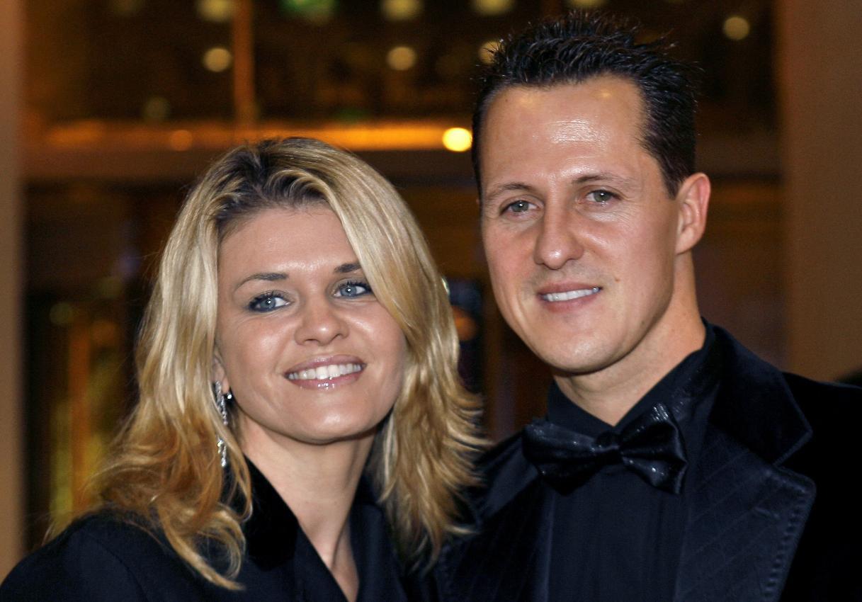 Traumpaar der Motorsportszene: Michael Schumacher und seine Corinna. © POOL / ERIC GAILLARD